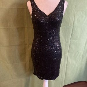 Love Reign black sequin size 7
